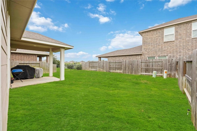 4427 Silvergrass Ln, Katy, TX 77493 - fenced backyard with a patio area