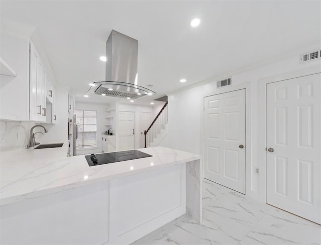 1691 W Sam Houston Pkwy S, Houston, TX 77042 - laundry room with recessed lighting and light marble finish floors