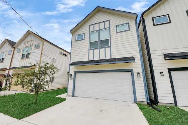 2119 Esther Dr, Houston, TX 77088 - view of front of property featuring an attached garage and driveway