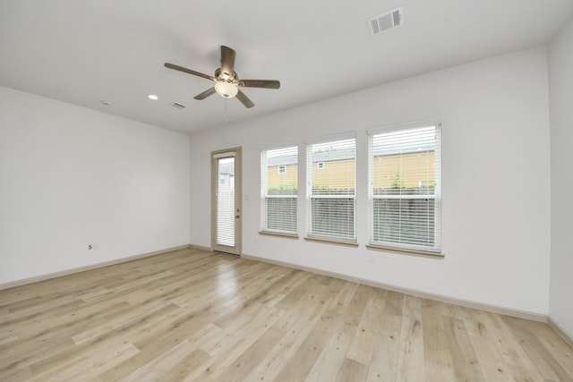 2119 Esther Dr, Houston, TX 77088 - empty room with healthy amount of natural light, light wood-style floors, a ceiling fan, and recessed lighting