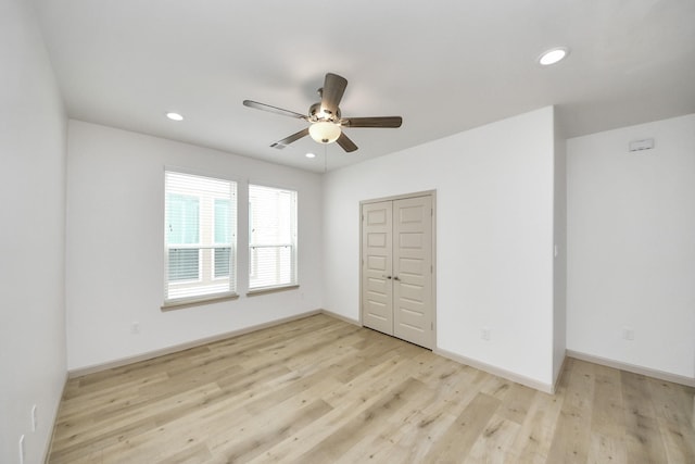2119 Esther Dr, Houston, TX 77088 - unfurnished bedroom with light wood-style floors, recessed lighting, a closet, and ceiling fan