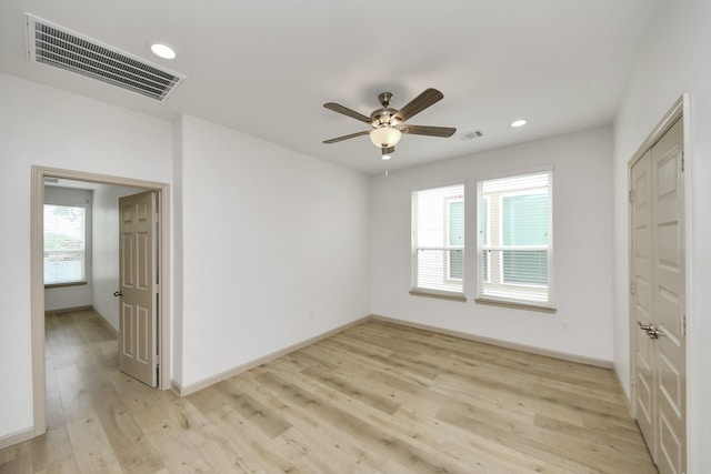 2119 Esther Dr, Houston, TX 77088 - unfurnished bedroom with light wood-style flooring, recessed lighting, and ceiling fan