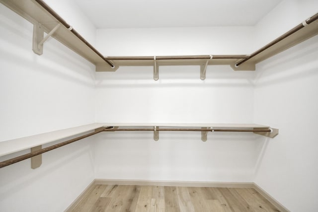 2119 Esther Dr, Houston, TX 77088 - walk in closet featuring light wood-style flooring