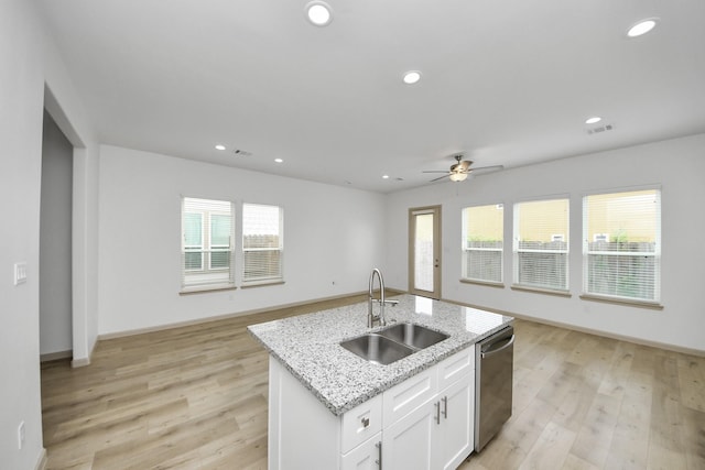 2119 Esther Dr, Houston, TX 77088 - kitchen featuring stainless steel dishwasher, open floor plan, healthy amount of natural light, and recessed lighting