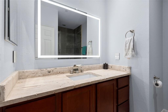 3001 Murworth Dr Unit 1603, Houston, TX 77025 - bathroom featuring vanity and a tile shower