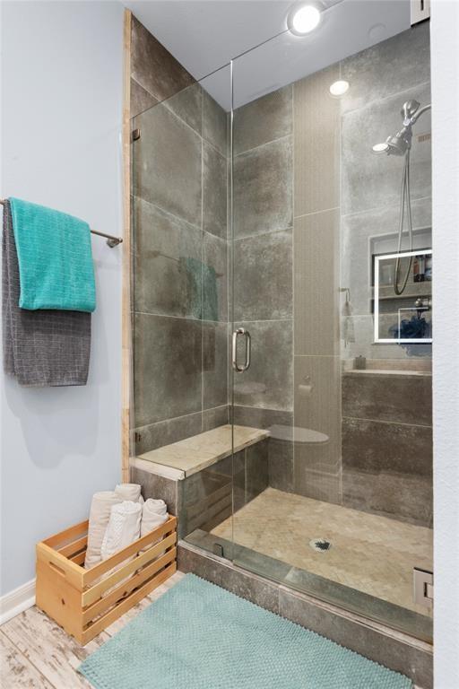 3001 Murworth Dr Unit 1603, Houston, TX 77025 - full bath featuring a shower stall and wood finished floors