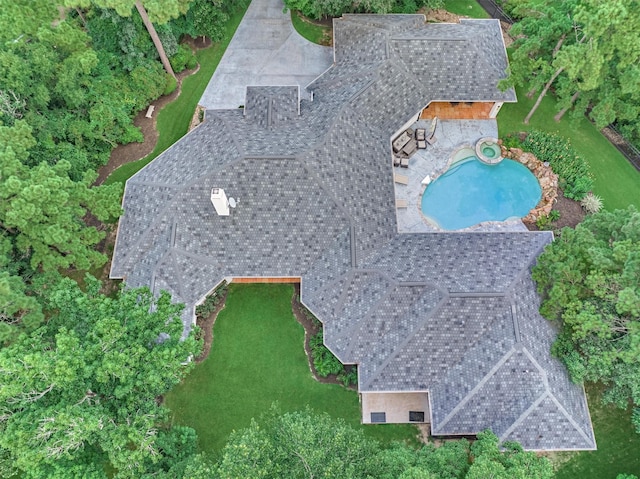 134 Trinity Oaks Ct, The Woodlands, TX 77381 - aerial view of property and surrounding area featuring a pool area