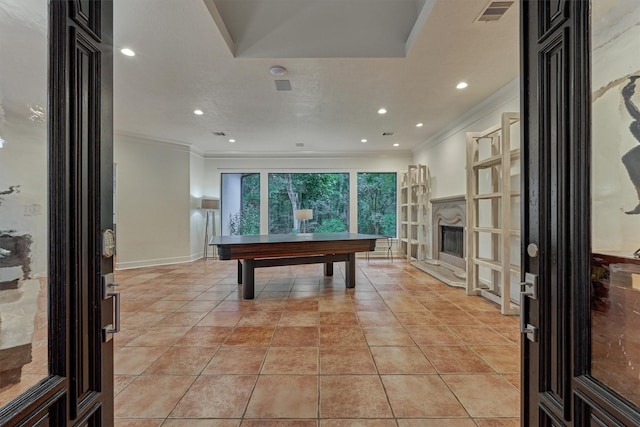 134 Trinity Oaks Ct, The Woodlands, TX 77381 - playroom featuring crown molding, recessed lighting, billiards, and a fireplace