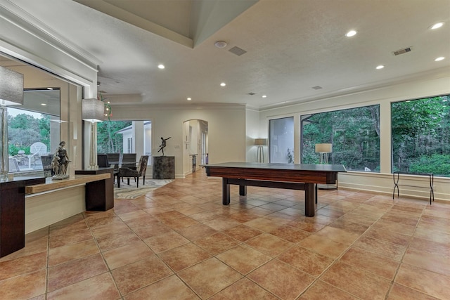 134 Trinity Oaks Ct, The Woodlands, TX 77381 - recreation room featuring arched walkways, recessed lighting, and crown molding