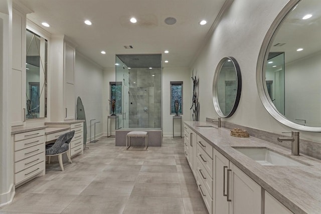 134 Trinity Oaks Ct, The Woodlands, TX 77381 - bathroom with double vanity, a stall shower, recessed lighting, and ornamental molding