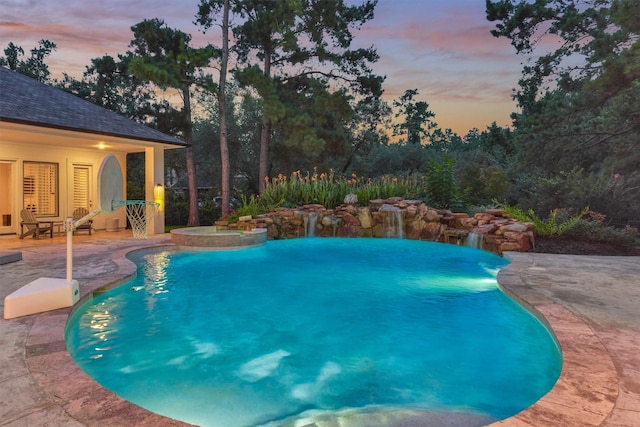 134 Trinity Oaks Ct, The Woodlands, TX 77381 - view of pool with a patio area and a pool with connected hot tub