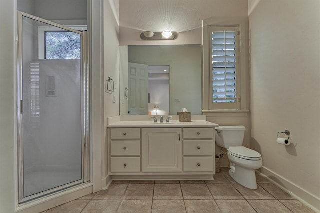 134 Trinity Oaks Ct, The Woodlands, TX 77381 - bathroom featuring vanity, a shower stall, and tile patterned floors
