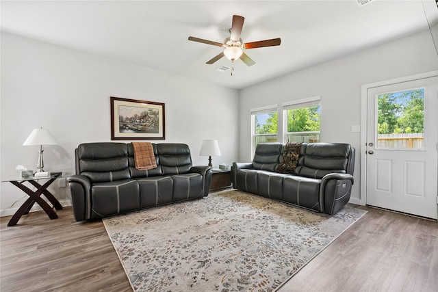 16934 Needlepoint Dr, Conroe, TX 77302 - living area featuring a ceiling fan and wood finished floors