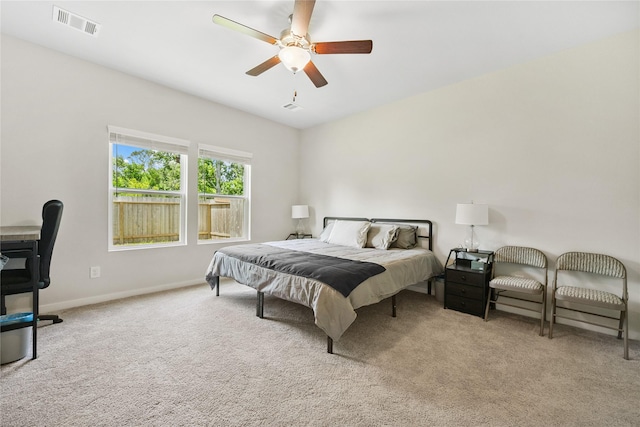 16934 Needlepoint Dr, Conroe, TX 77302 - carpeted bedroom featuring baseboards and a ceiling fan