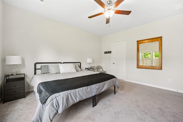 16934 Needlepoint Dr, Conroe, TX 77302 - bedroom with carpet floors and ceiling fan