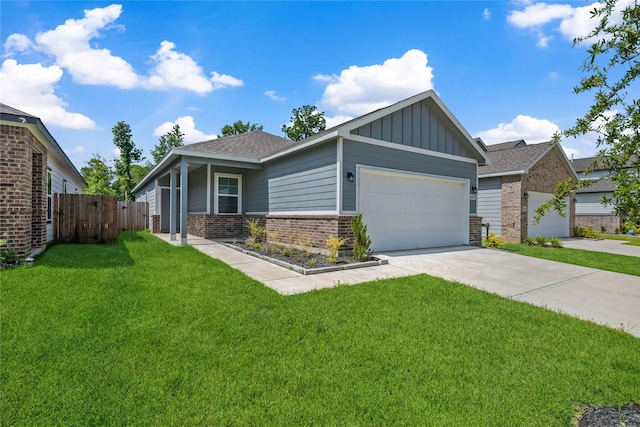 16934 Needlepoint Dr, Conroe, TX 77302 - ranch-style house with brick siding, board and batten siding, a garage, driveway, and a shingled roof
