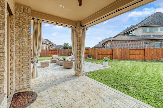 24115 Porte Toscana Ln, Richmond, TX 77406 - fenced backyard with a patio area and outdoor lounge area