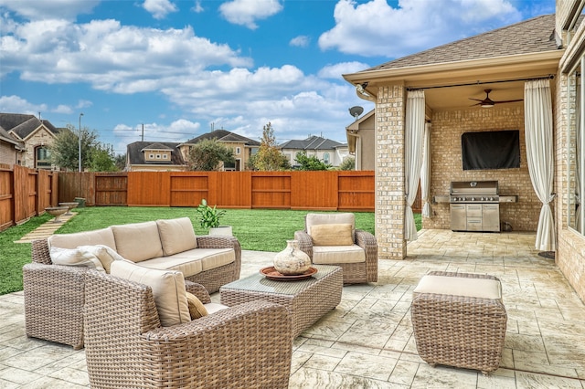 24115 Porte Toscana Ln, Richmond, TX 77406 - fenced backyard with a patio area, grilling area, outdoor lounge area, and a ceiling fan