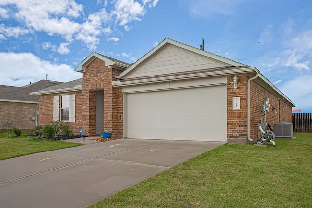 22618 Cremona Village Trl, Katy, TX 77449 - view of front of home with concrete driveway, brick siding, a front yard, and a garage