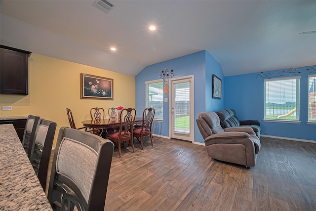 22618 Cremona Village Trl, Katy, TX 77449 - dining area featuring wood finished floors, lofted ceiling, and recessed lighting