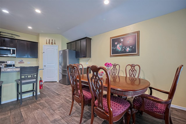 22618 Cremona Village Trl, Katy, TX 77449 - dining area with dark wood-type flooring, recessed lighting, and lofted ceiling