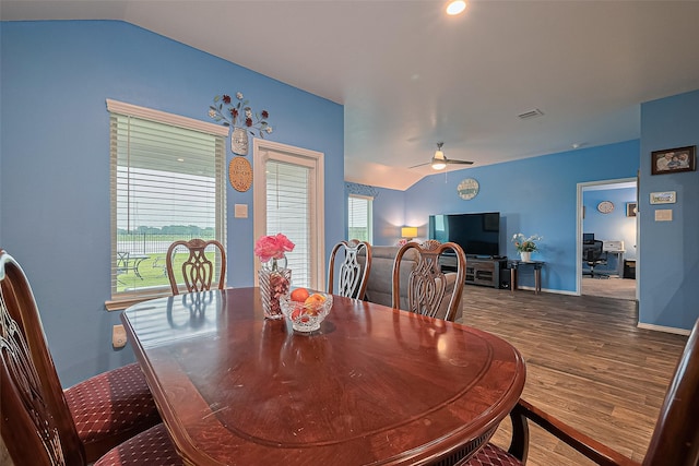 22618 Cremona Village Trl, Katy, TX 77449 - dining space with lofted ceiling, dark wood-style floors, and a ceiling fan
