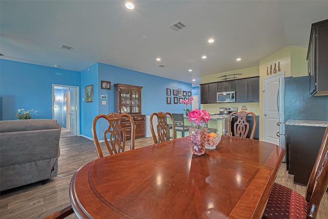 22618 Cremona Village Trl, Katy, TX 77449 - dining area featuring wood finished floors and recessed lighting