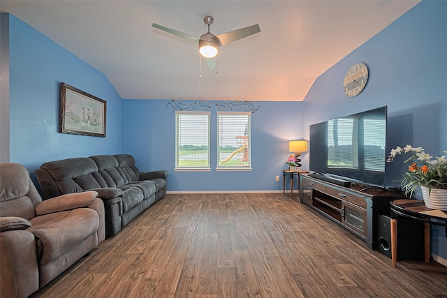 22618 Cremona Village Trl, Katy, TX 77449 - living area with vaulted ceiling, wood finished floors, plenty of natural light, and a ceiling fan