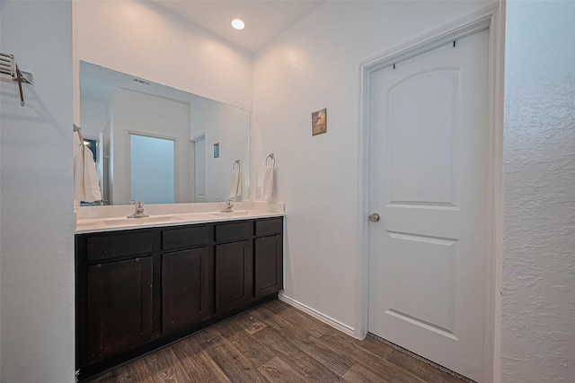 22618 Cremona Village Trl, Katy, TX 77449 - bathroom featuring double vanity and wood finished floors