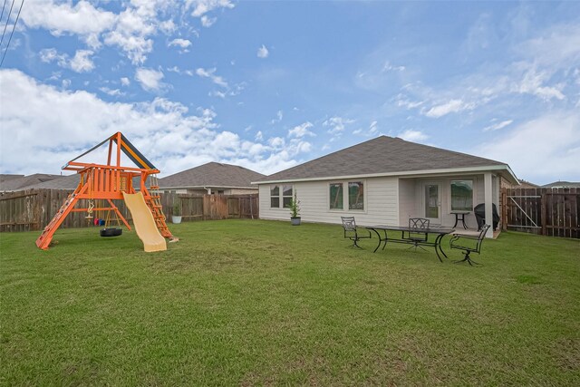 22618 Cremona Village Trl, Katy, TX 77449 - rear view of property with a fenced backyard and a playground