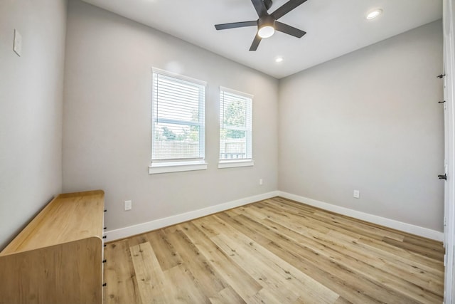 6524 Couch St, Houston, TX 77091 - unfurnished room with a ceiling fan, light wood-style floors, and recessed lighting