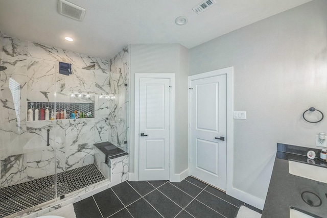 6524 Couch St, Houston, TX 77091 - full bathroom with a marble finish shower, tile patterned flooring, and recessed lighting