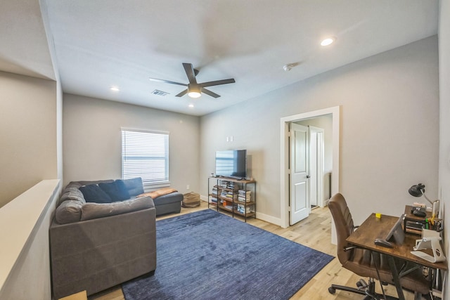 6524 Couch St, Houston, TX 77091 - living area featuring a ceiling fan, a desk, light wood-style flooring, and recessed lighting
