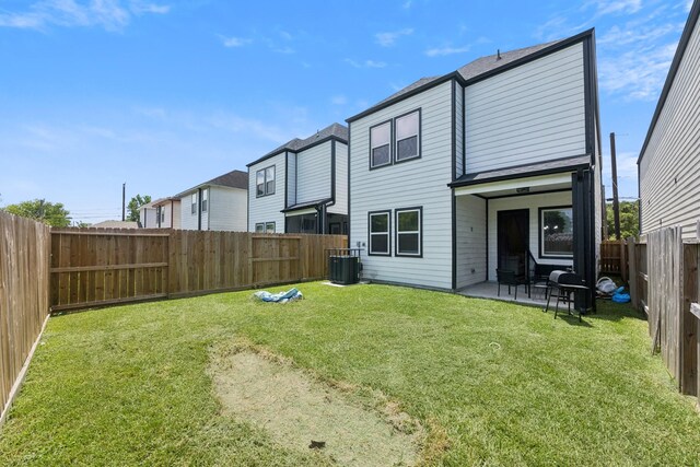 6524 Couch St, Houston, TX 77091 - rear view of property with a fenced backyard and a patio
