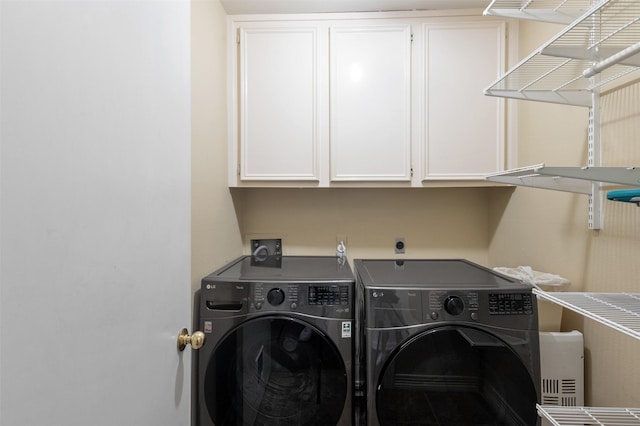 11603 Orchard Mountain Dr, Houston, TX 77059 - washroom with independent washer and dryer and cabinet space
