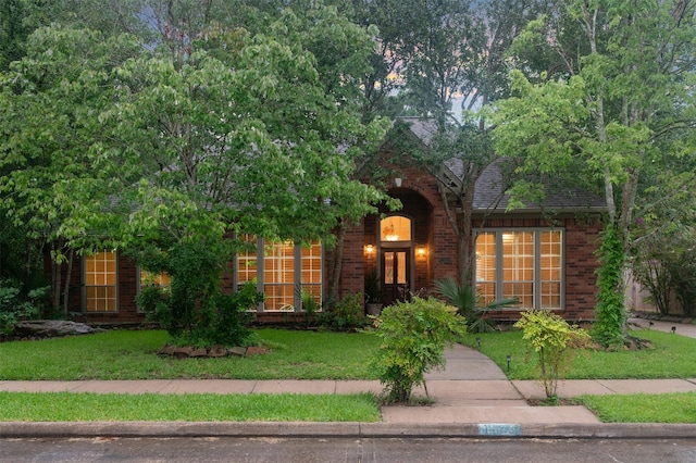 11603 Orchard Mountain Dr, Houston, TX 77059 - view of front of house with brick siding and a front yard