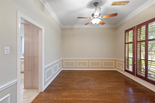 11603 Orchard Mountain Dr, Houston, TX 77059 - empty room with ornamental molding, a ceiling fan, a decorative wall, a wainscoted wall, and wood finished floors