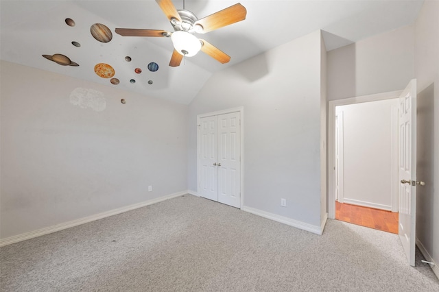 11603 Orchard Mountain Dr, Houston, TX 77059 - unfurnished bedroom featuring carpet floors, vaulted ceiling, a closet, and a ceiling fan