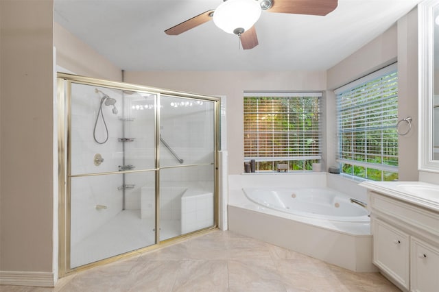 11603 Orchard Mountain Dr, Houston, TX 77059 - full bath featuring vanity, a jetted tub, a shower stall, ceiling fan, and marble finish floors