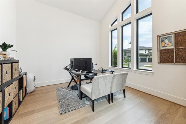 15714 Park Poetry Ct, Cypress, TX 77433 - home office featuring light wood finished floors and vaulted ceiling