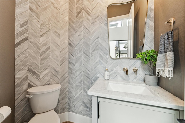 15714 Park Poetry Ct, Cypress, TX 77433 - half bathroom with vanity and tile walls