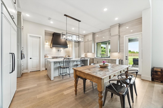 15714 Park Poetry Ct, Cypress, TX 77433 - dining area featuring light wood finished floors and recessed lighting