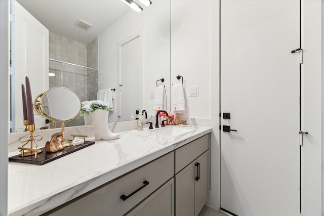 15714 Park Poetry Ct, Cypress, TX 77433 - bathroom featuring vanity and a tile shower