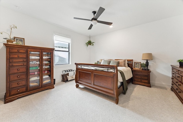 15714 Park Poetry Ct, Cypress, TX 77433 - bedroom featuring light colored carpet and ceiling fan