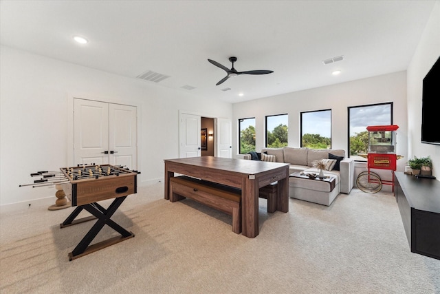 15714 Park Poetry Ct, Cypress, TX 77433 - living room featuring a ceiling fan, light colored carpet, and recessed lighting