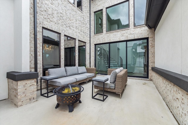 15714 Park Poetry Ct, Cypress, TX 77433 - view of patio / terrace featuring an outdoor living space with a fire pit