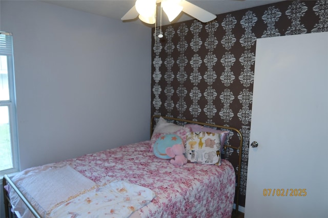 305 Duprie Dr, Brenham, TX 77833 - bedroom with multiple windows and a ceiling fan