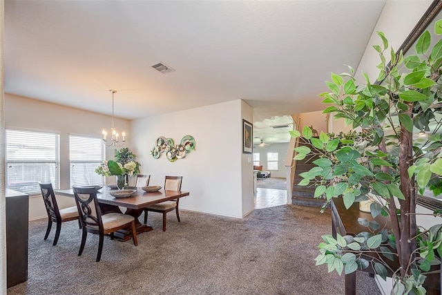 4006 Vicenza Ave, Katy, TX 77493 - dining room with carpet, healthy amount of natural light, and a chandelier