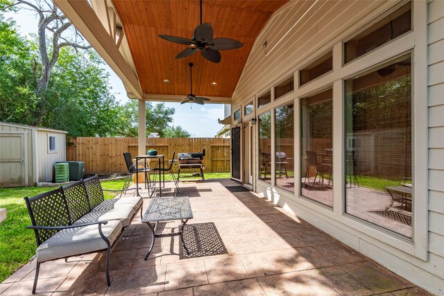 3211 Rock Brook Falls Ln, League City, TX 77573 - view of patio / terrace featuring outdoor dining area, a ceiling fan, a shed, and an outdoor living space