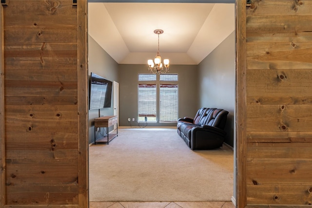 3211 Rock Brook Falls Ln, League City, TX 77573 - living area with carpet floors, a chandelier, vaulted ceiling, and tile patterned flooring